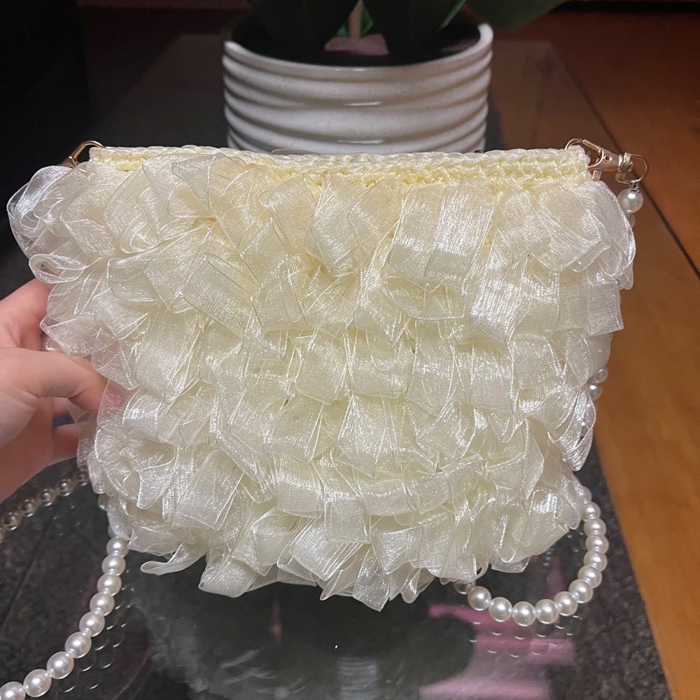 Woman purse faux pearls